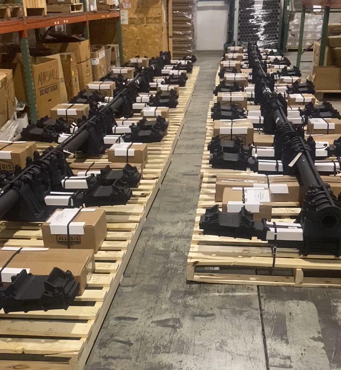 Generator parts kits and leaf-spring assemblies arranged on pallets for shipment